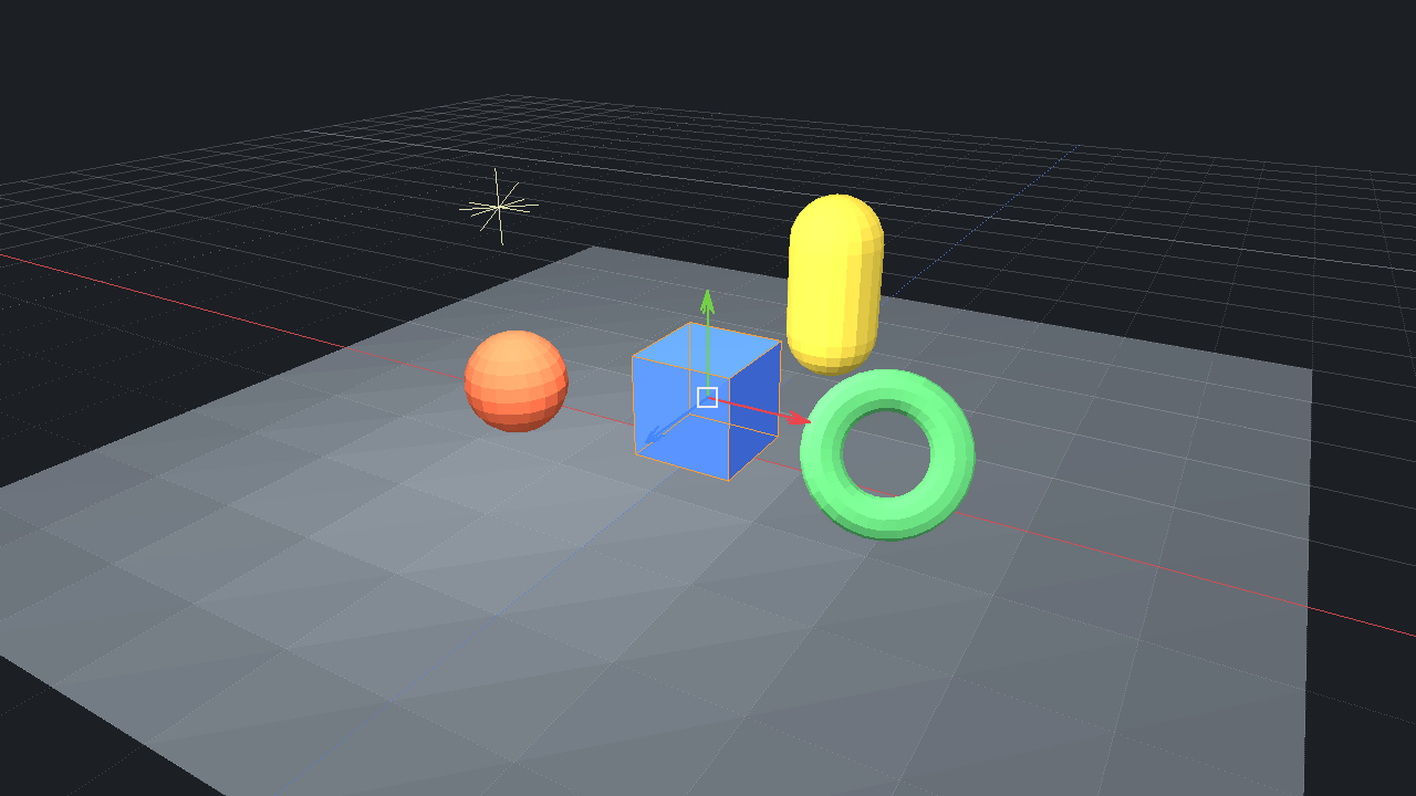 The viewport of the Raven Bevy Editor: a blue cube selected with its move gizmo, a sphere, a capsule and a torus on a grid